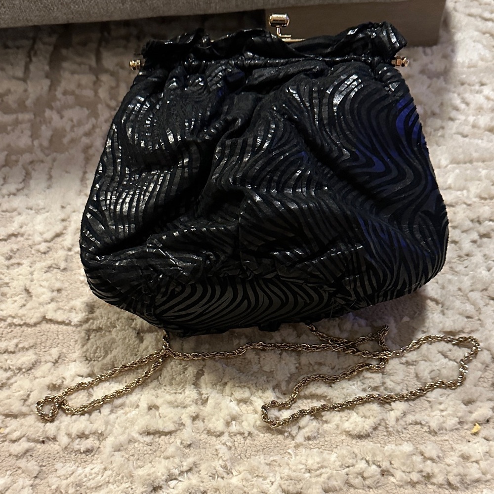 Chic Black and Gold Clutch with Chain Strap